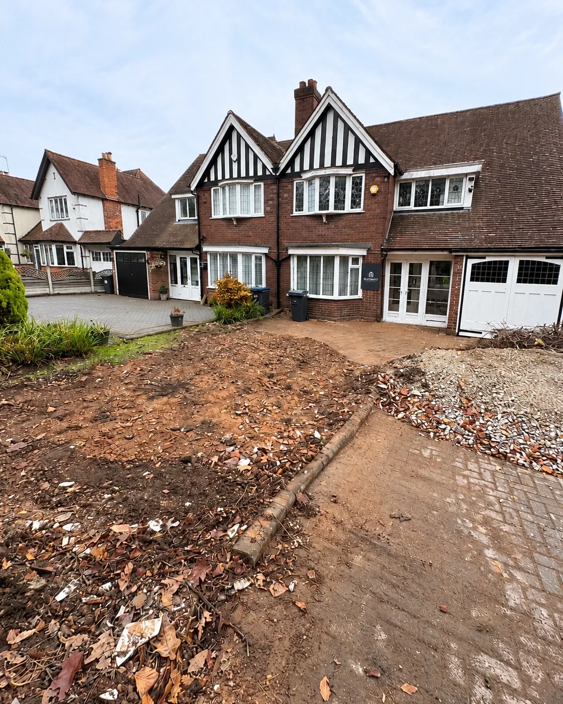 Front garden with soil and spoil after excavation and site clearance